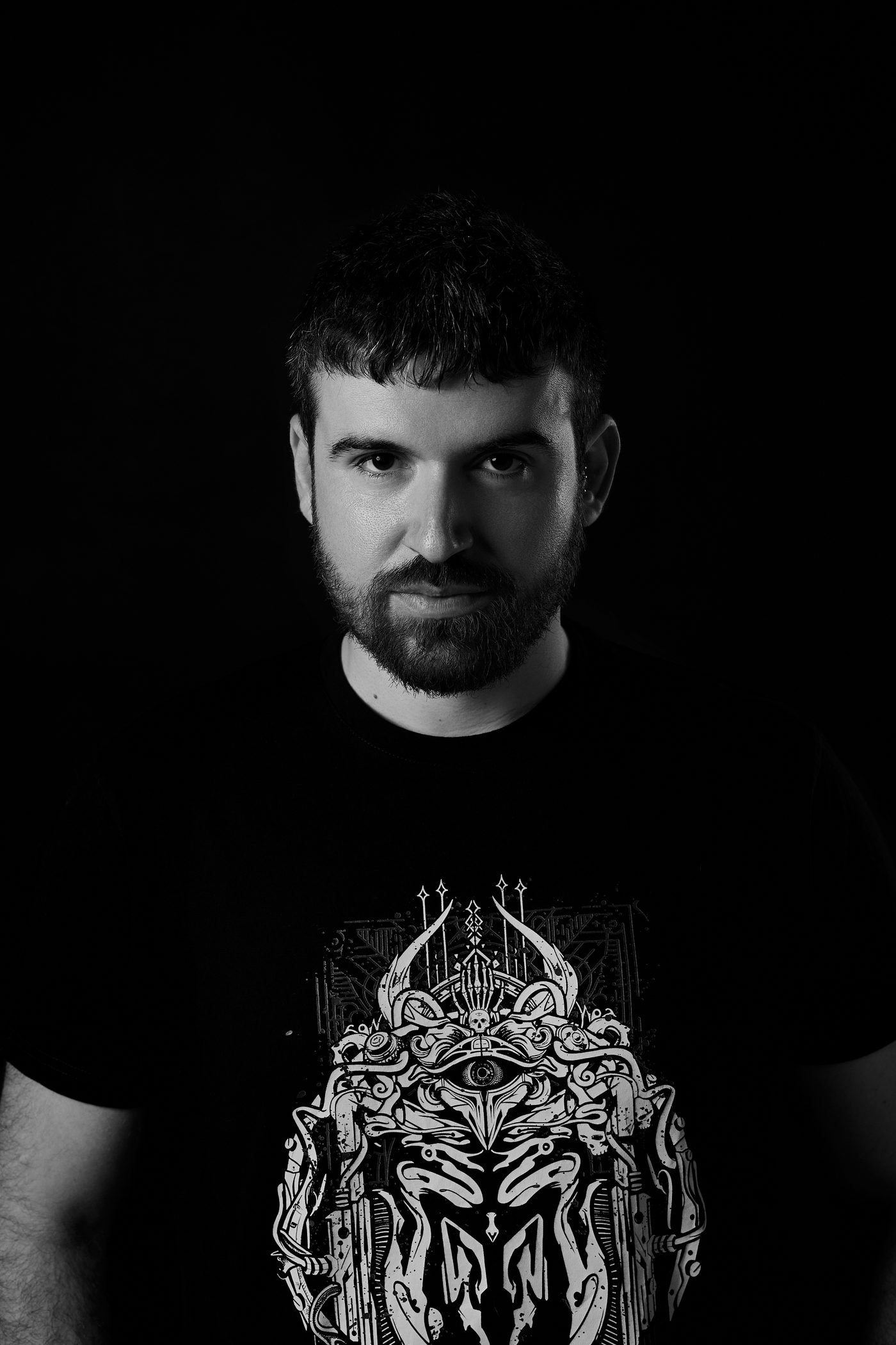 Vasilis Iakovidis, the producer behind Spektron, in a low-key black-and-white portrait